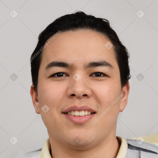 Joyful asian young-adult male with short  black hair and brown eyes