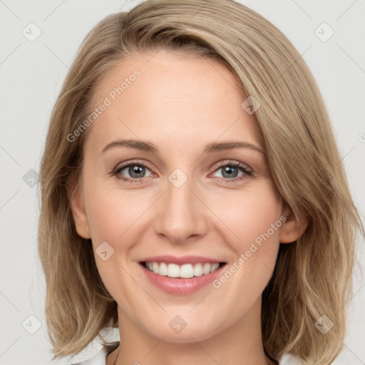 Joyful white young-adult female with medium  brown hair and green eyes