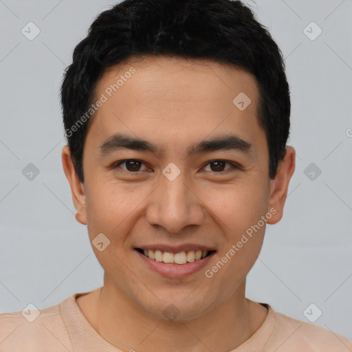 Joyful latino young-adult male with short  brown hair and brown eyes