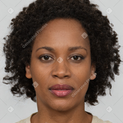 Neutral black young-adult female with medium  brown hair and brown eyes