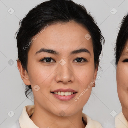 Joyful asian young-adult female with medium  brown hair and brown eyes