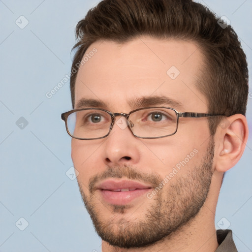 Joyful white young-adult male with short  brown hair and brown eyes