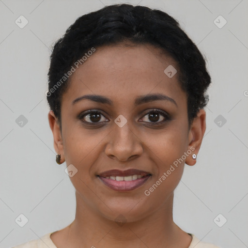 Joyful latino young-adult female with short  black hair and brown eyes