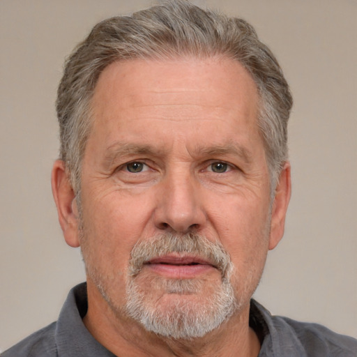 Neutral white middle-aged male with short  gray hair and brown eyes