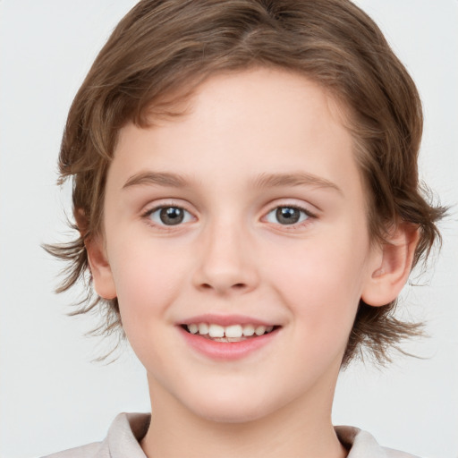 Joyful white child female with medium  brown hair and brown eyes