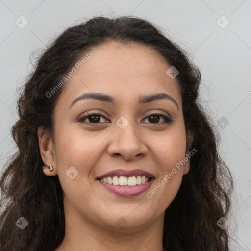 Joyful latino young-adult female with long  brown hair and brown eyes