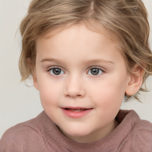 Joyful white child female with medium  brown hair and grey eyes