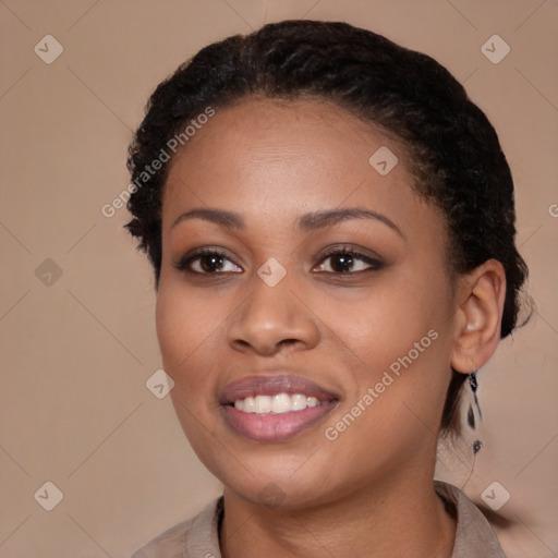 Joyful black young-adult female with medium  black hair and brown eyes