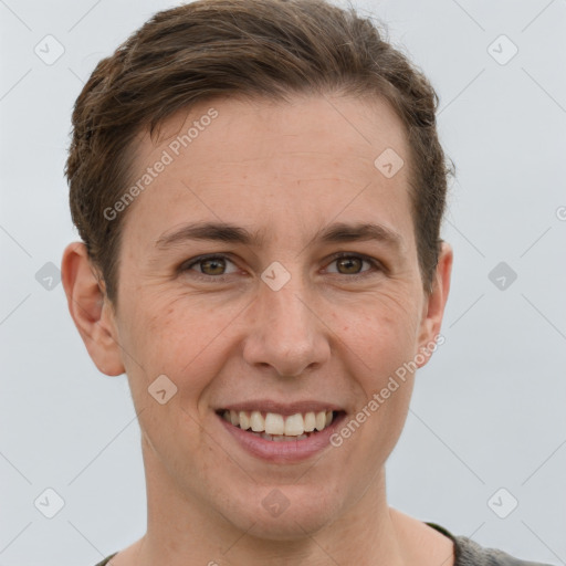 Joyful white adult female with short  brown hair and grey eyes