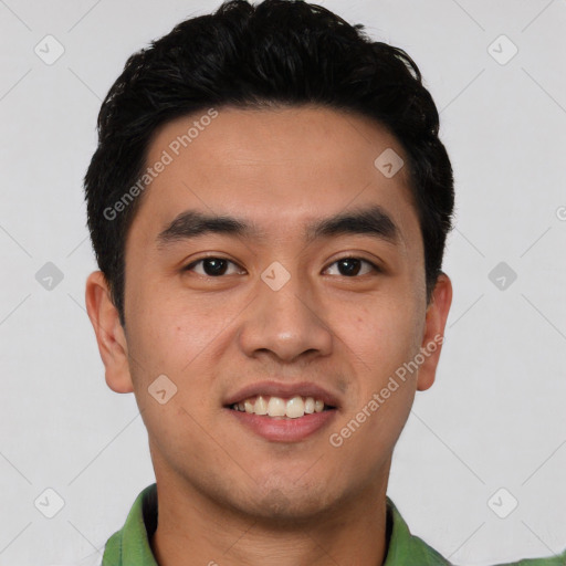 Joyful latino young-adult male with short  black hair and brown eyes