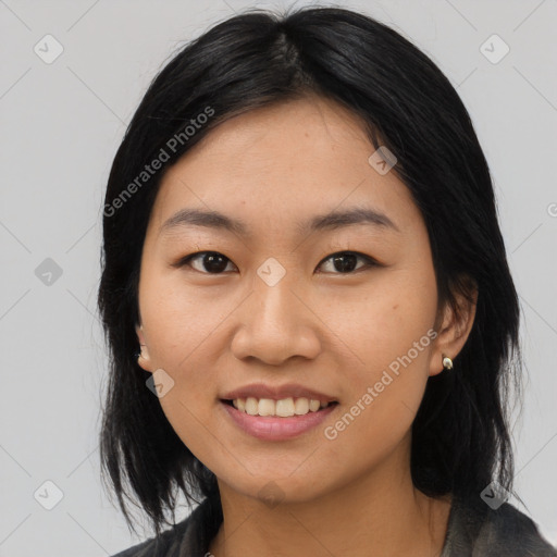 Joyful asian young-adult female with medium  brown hair and brown eyes