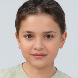 Joyful white child female with short  brown hair and brown eyes