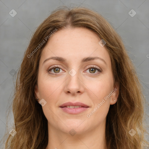 Joyful white young-adult female with long  brown hair and green eyes