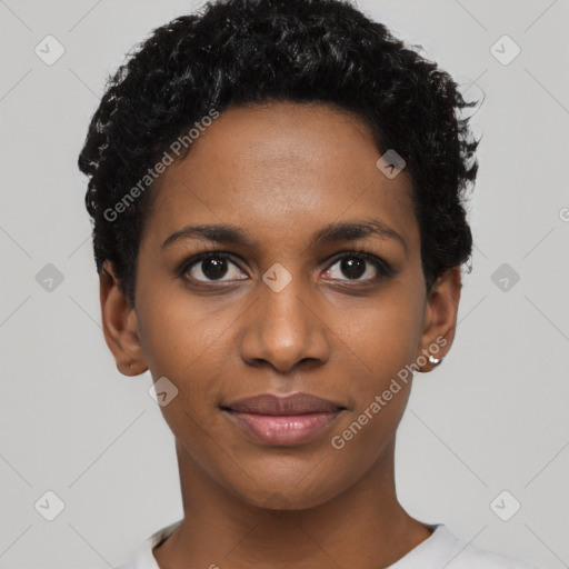 Joyful black young-adult female with short  black hair and brown eyes