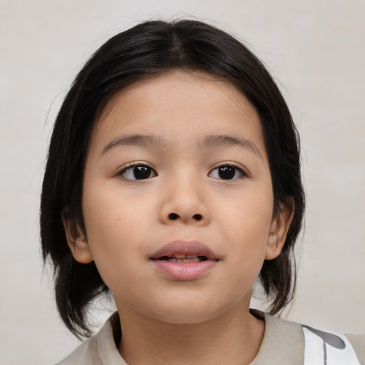 Neutral asian child female with medium  brown hair and brown eyes