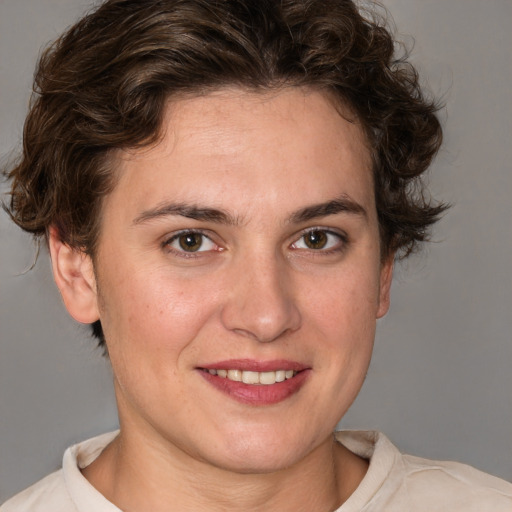 Joyful white young-adult female with medium  brown hair and brown eyes