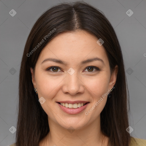 Joyful white young-adult female with long  brown hair and brown eyes