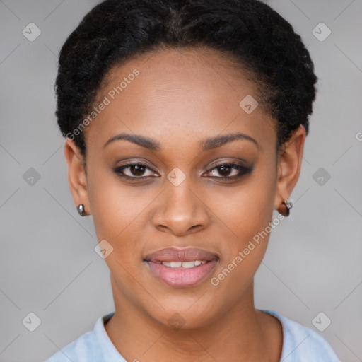 Joyful black young-adult female with short  black hair and brown eyes