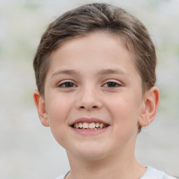 Joyful white child female with short  brown hair and brown eyes