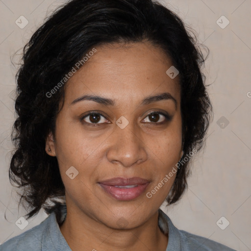 Joyful black adult female with medium  brown hair and brown eyes