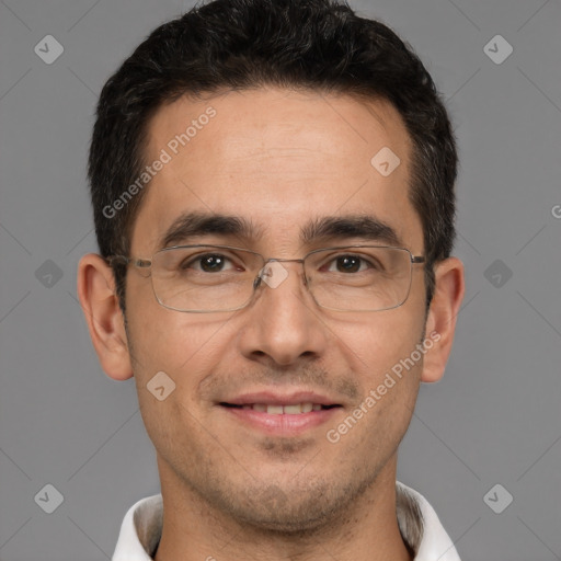 Joyful white adult male with short  brown hair and brown eyes