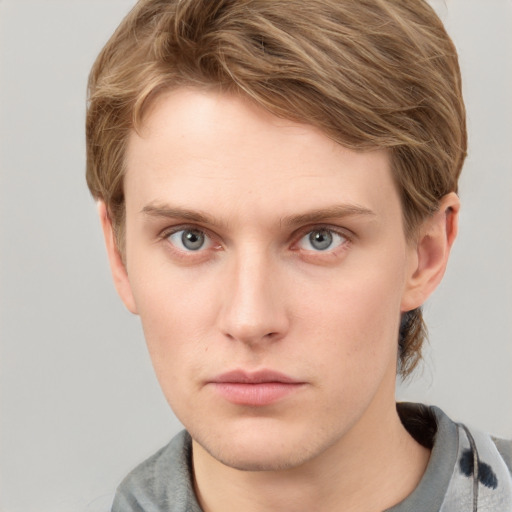 Neutral white young-adult male with short  brown hair and blue eyes