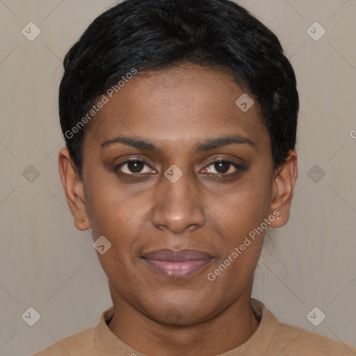 Joyful black young-adult female with short  brown hair and brown eyes