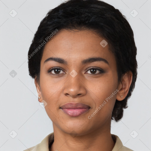 Joyful latino young-adult female with short  black hair and brown eyes