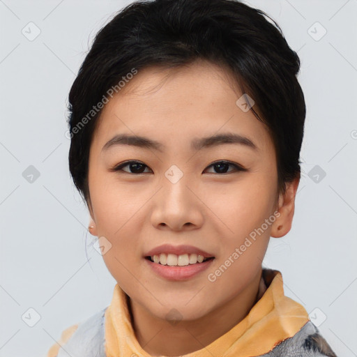 Joyful asian young-adult female with short  black hair and brown eyes
