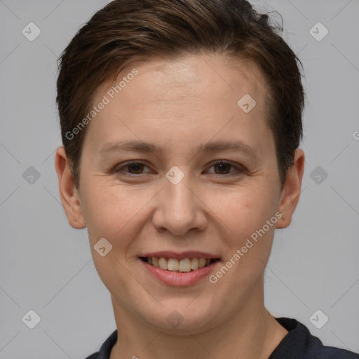 Joyful white young-adult female with short  brown hair and grey eyes