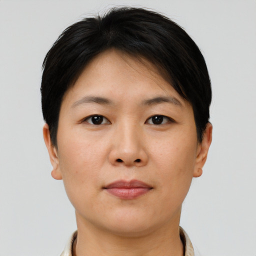 Neutral asian young-adult female with short  brown hair and brown eyes