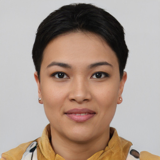 Joyful asian young-adult female with short  black hair and brown eyes