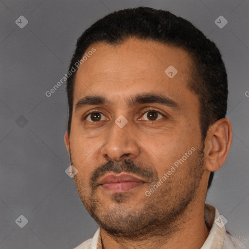Neutral latino young-adult male with short  black hair and brown eyes