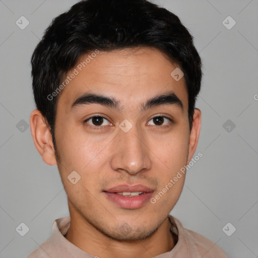 Joyful latino young-adult male with short  brown hair and brown eyes