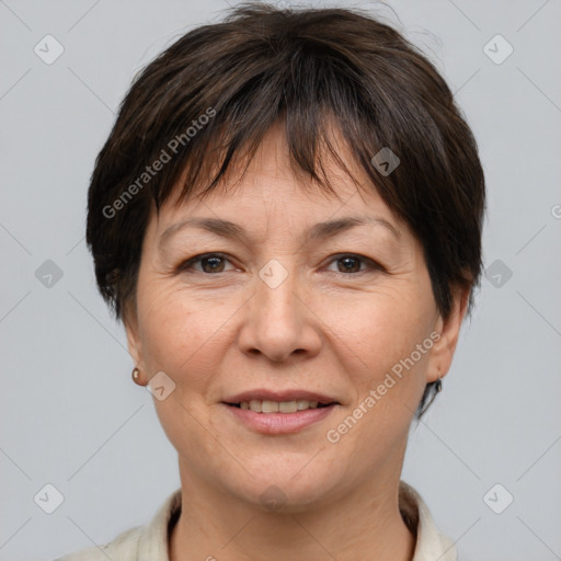 Joyful white adult female with short  brown hair and brown eyes