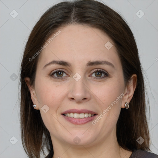 Joyful white young-adult female with medium  brown hair and grey eyes