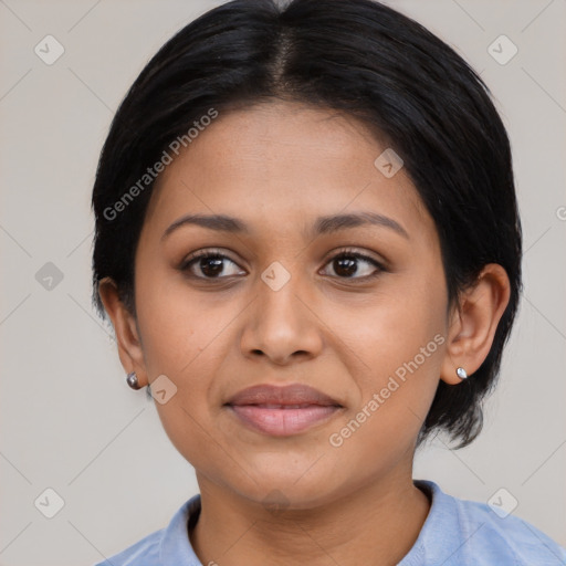 Joyful latino young-adult female with medium  black hair and brown eyes