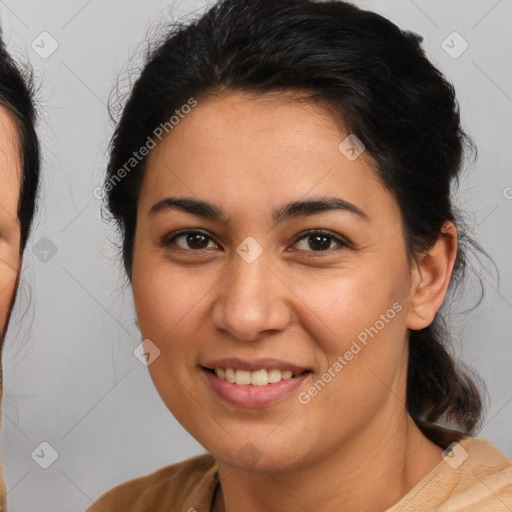 Joyful latino young-adult female with medium  brown hair and brown eyes