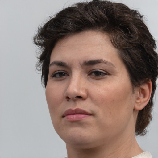 Neutral white young-adult female with medium  brown hair and brown eyes