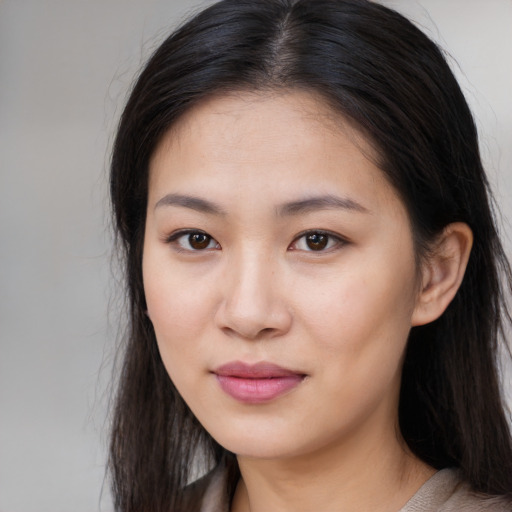 Neutral asian young-adult female with long  brown hair and brown eyes