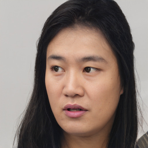 Neutral asian young-adult female with long  black hair and brown eyes