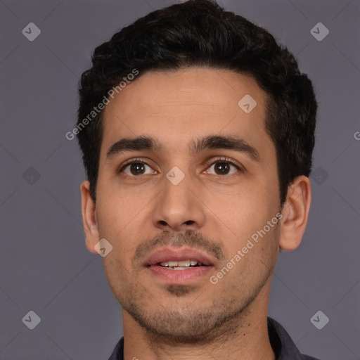Neutral white young-adult male with short  black hair and brown eyes