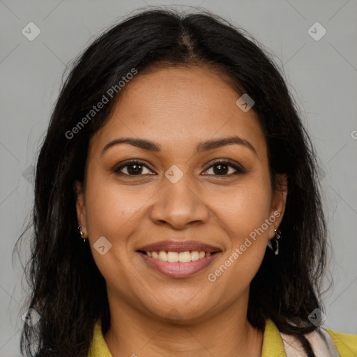 Joyful latino young-adult female with long  brown hair and brown eyes