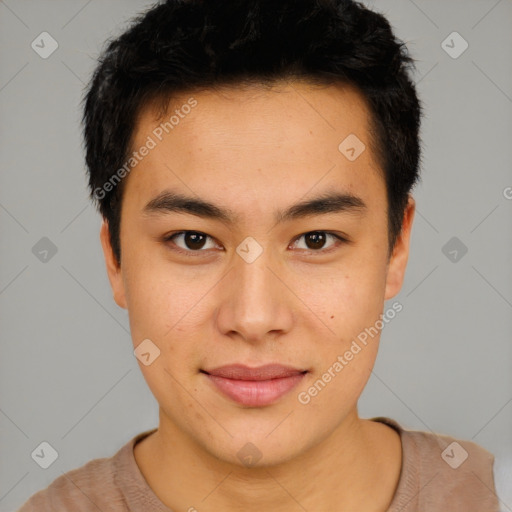 Joyful asian young-adult male with short  brown hair and brown eyes