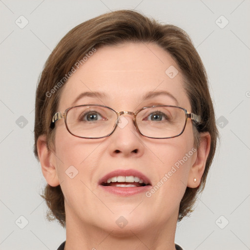 Joyful white adult female with short  brown hair and grey eyes