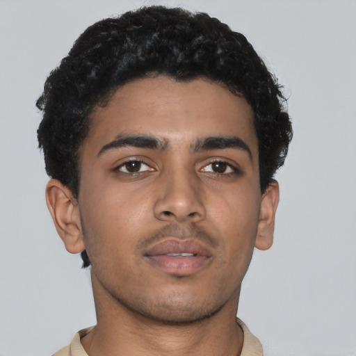 Neutral latino young-adult male with short  brown hair and brown eyes