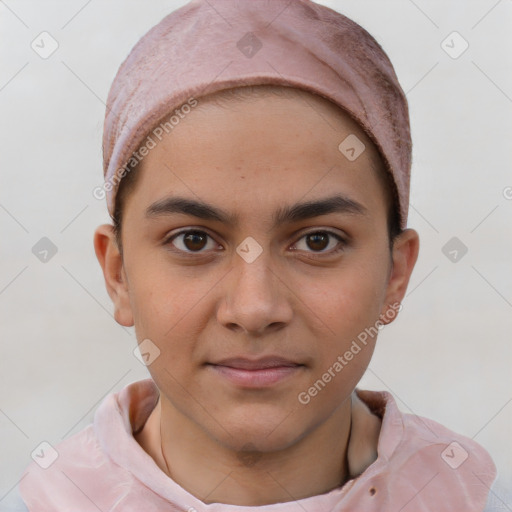 Joyful white child male with short  brown hair and brown eyes