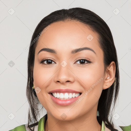 Joyful white young-adult female with medium  black hair and brown eyes