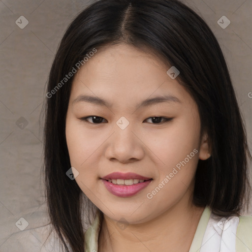 Joyful asian young-adult female with long  brown hair and brown eyes