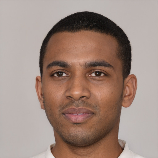 Neutral black young-adult male with short  black hair and brown eyes